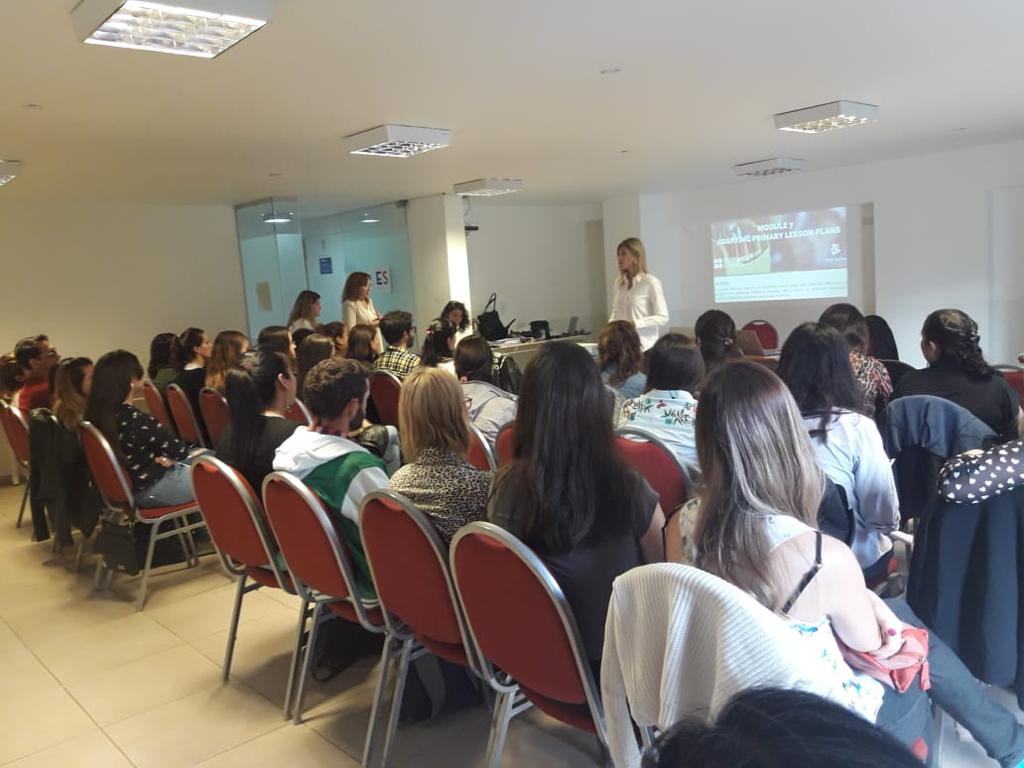 Teachers attending an in-person ELT training session